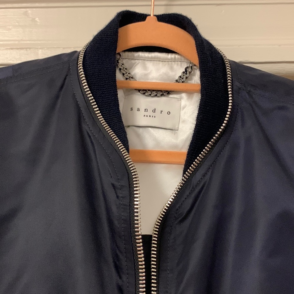 Sandro - Navy Blue Flight Jacket w/ white lining. It’s a size M - short.